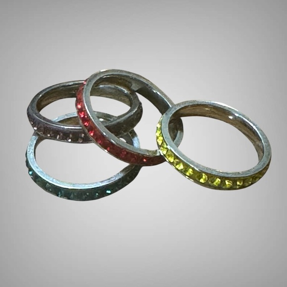 SET OF FOUR STACKABLE STAINLESS STEEL RINGS - Picture 2 of 8